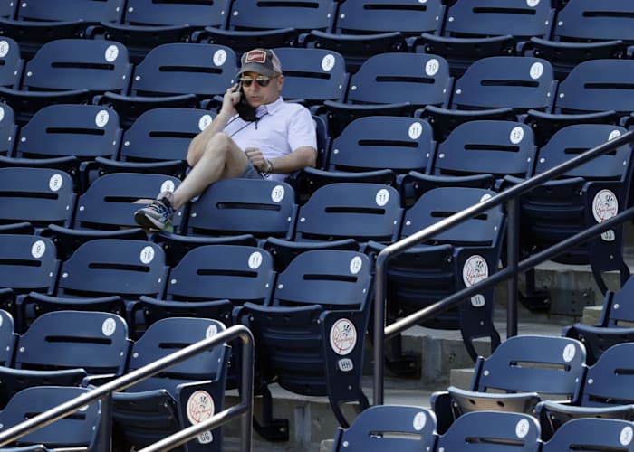 New York Yankees GM Brian Cashman on the phone